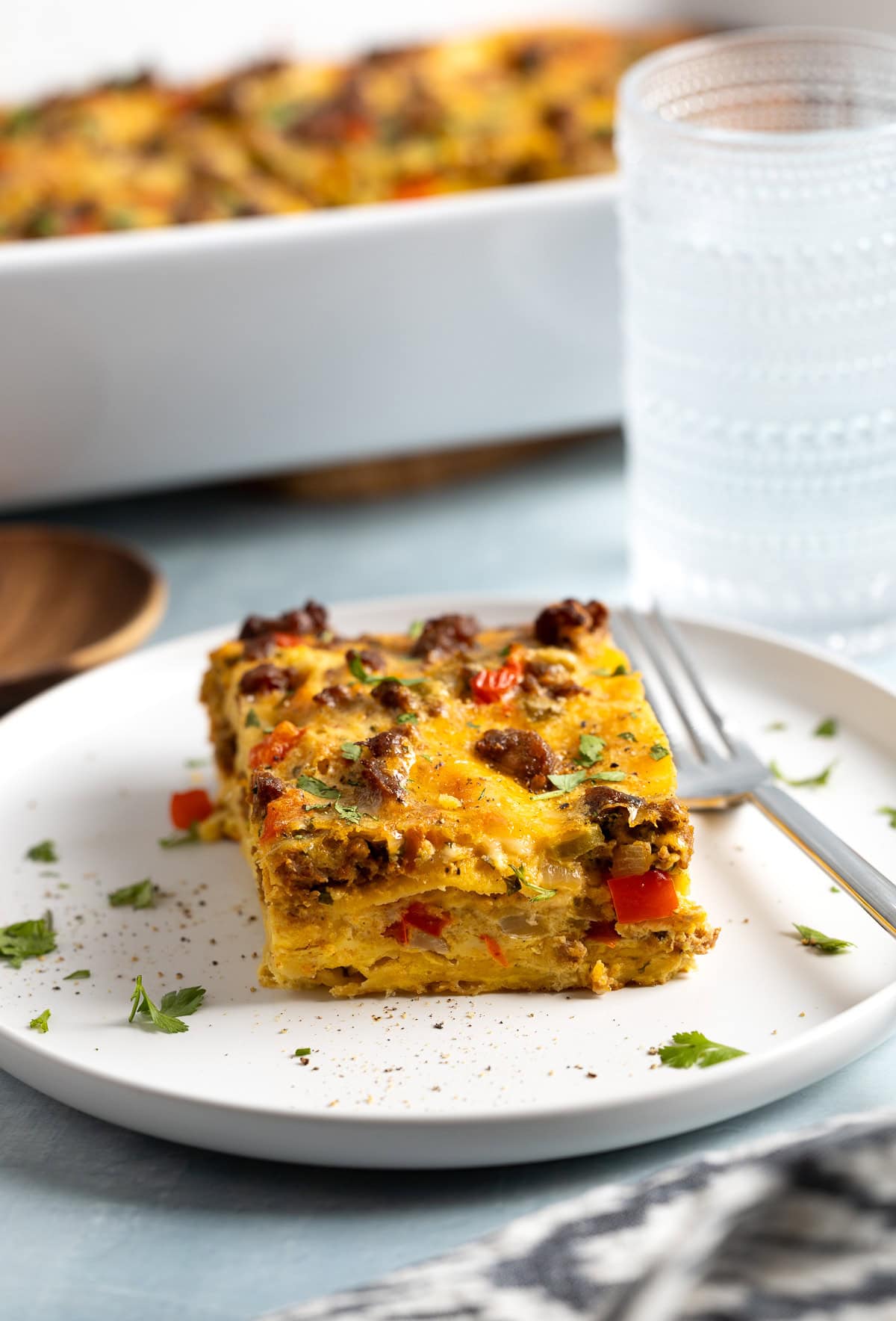 A slice of chorizo egg bake on a plate.