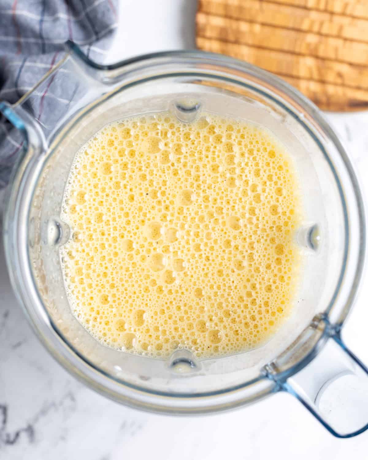 The blended egg and cottage cheese mixture in a blender.