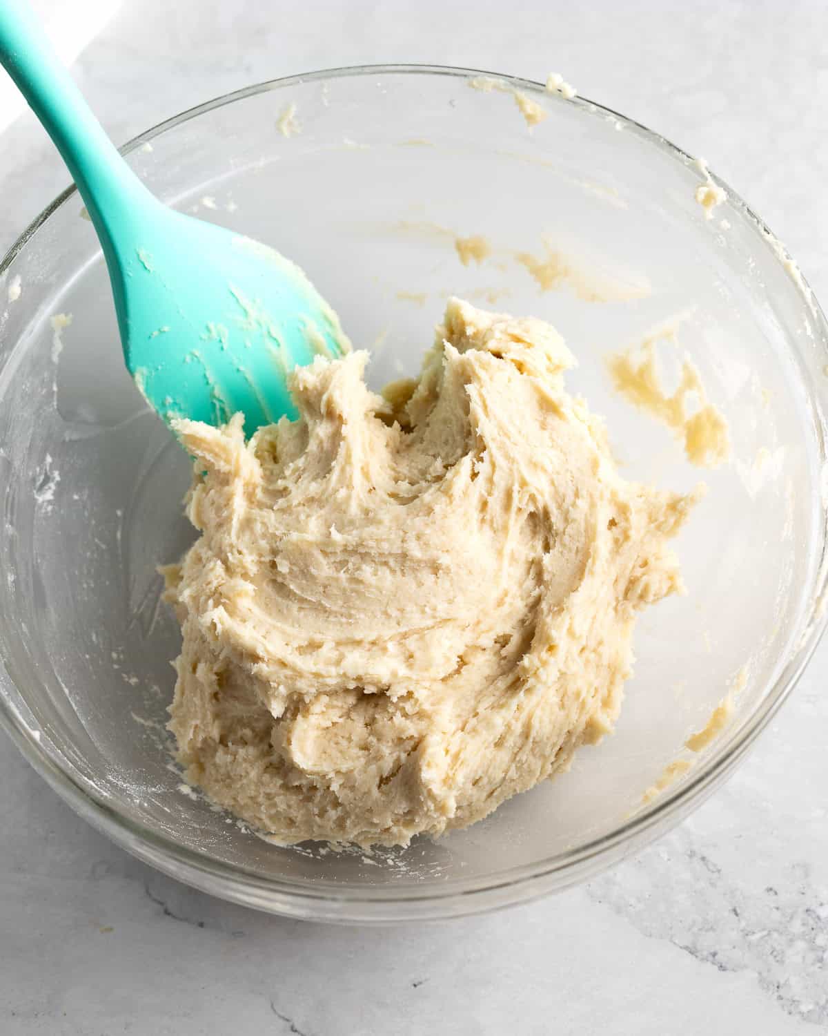 The thumbprint cookie dough mixed together in a bowl.