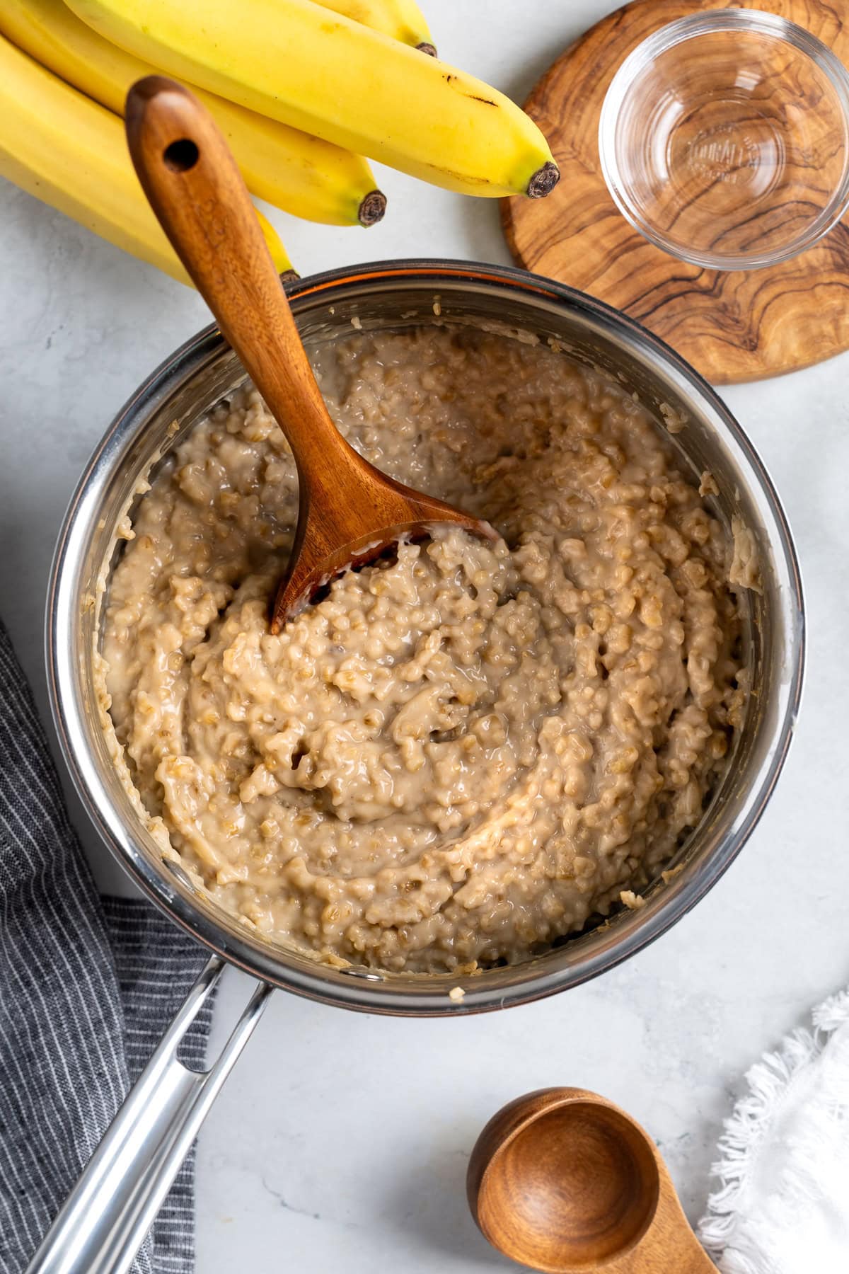 Thick and creamy stovetop steel cut oats in a pot.