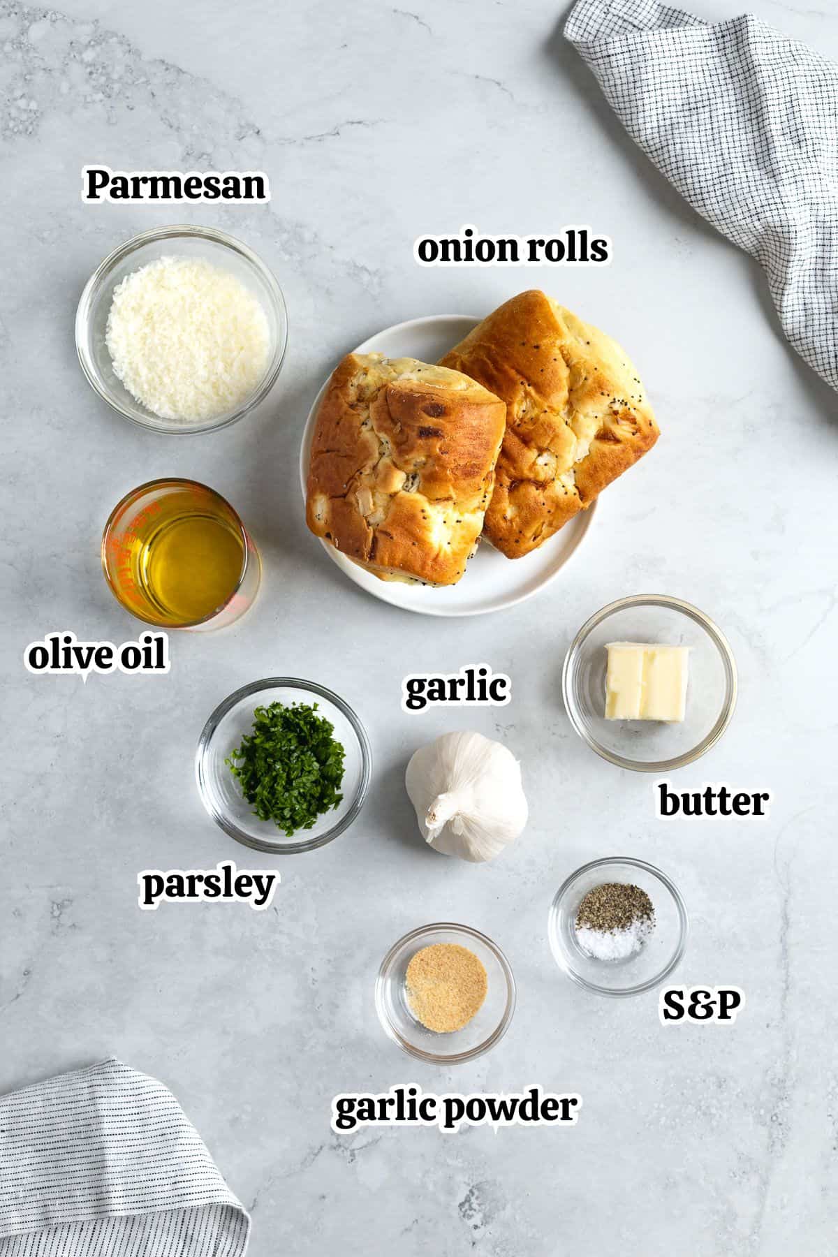 Text-labeled onion garlic bread ingredients in separate containers.
