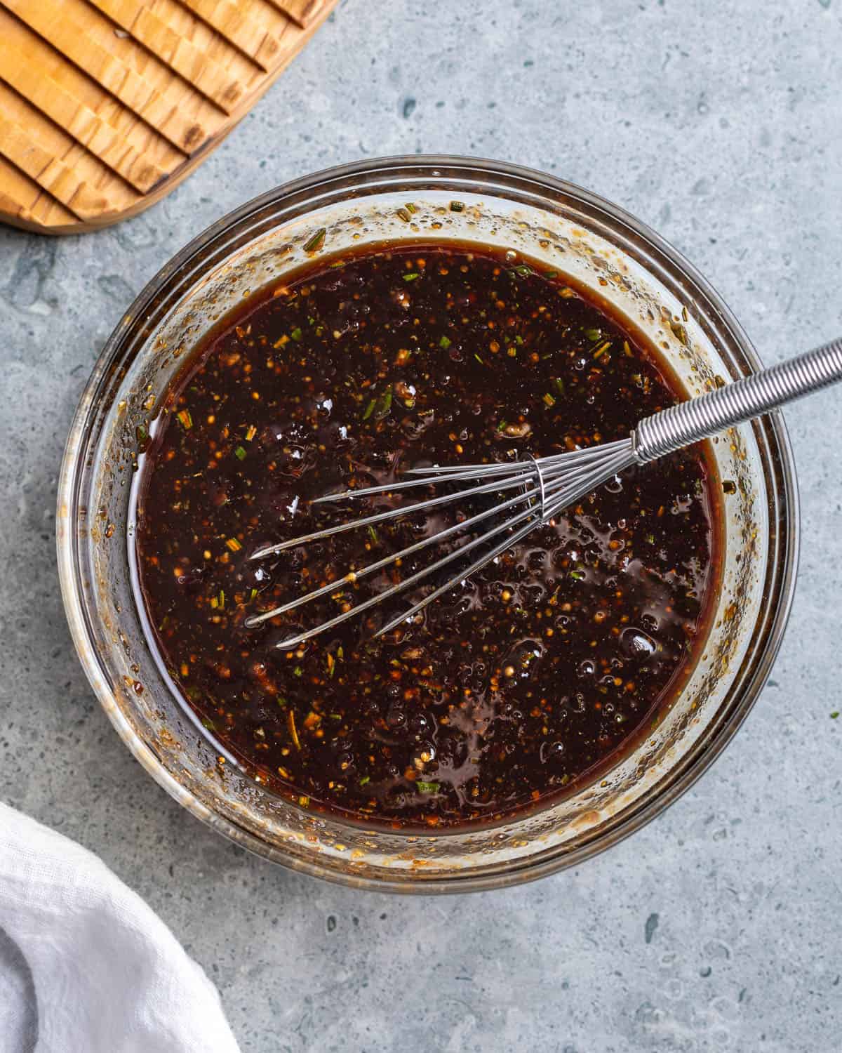 The raspberry sauce whisked together in a bowl.