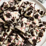 A serving plate of Oreo peppermint bark pieces.