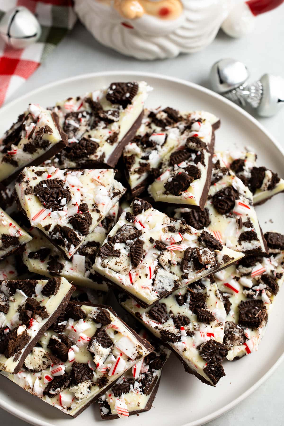 A serving plate of Oreo peppermint bark pieces.