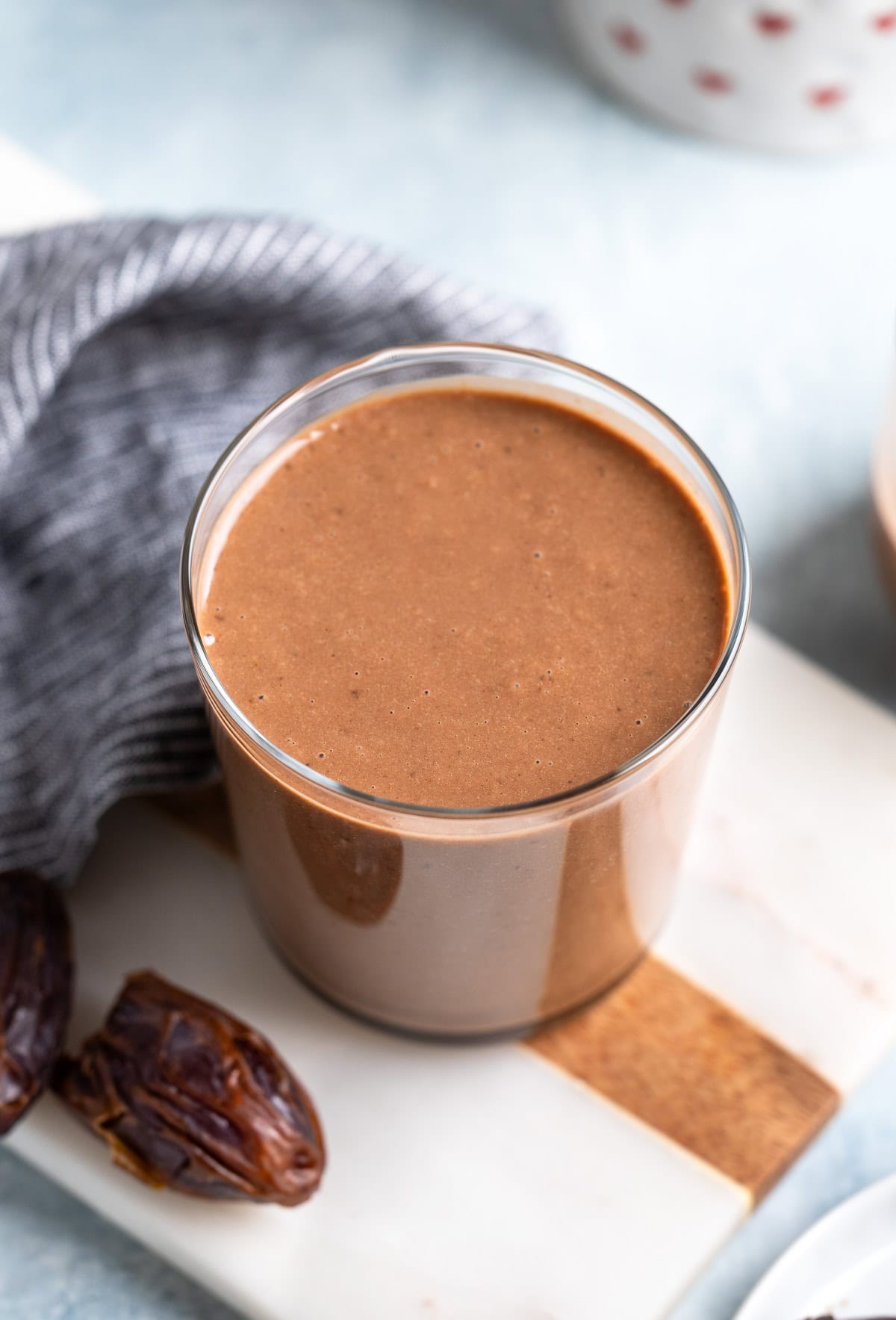 A thick peanut butter chocolate smoothie made with dates.