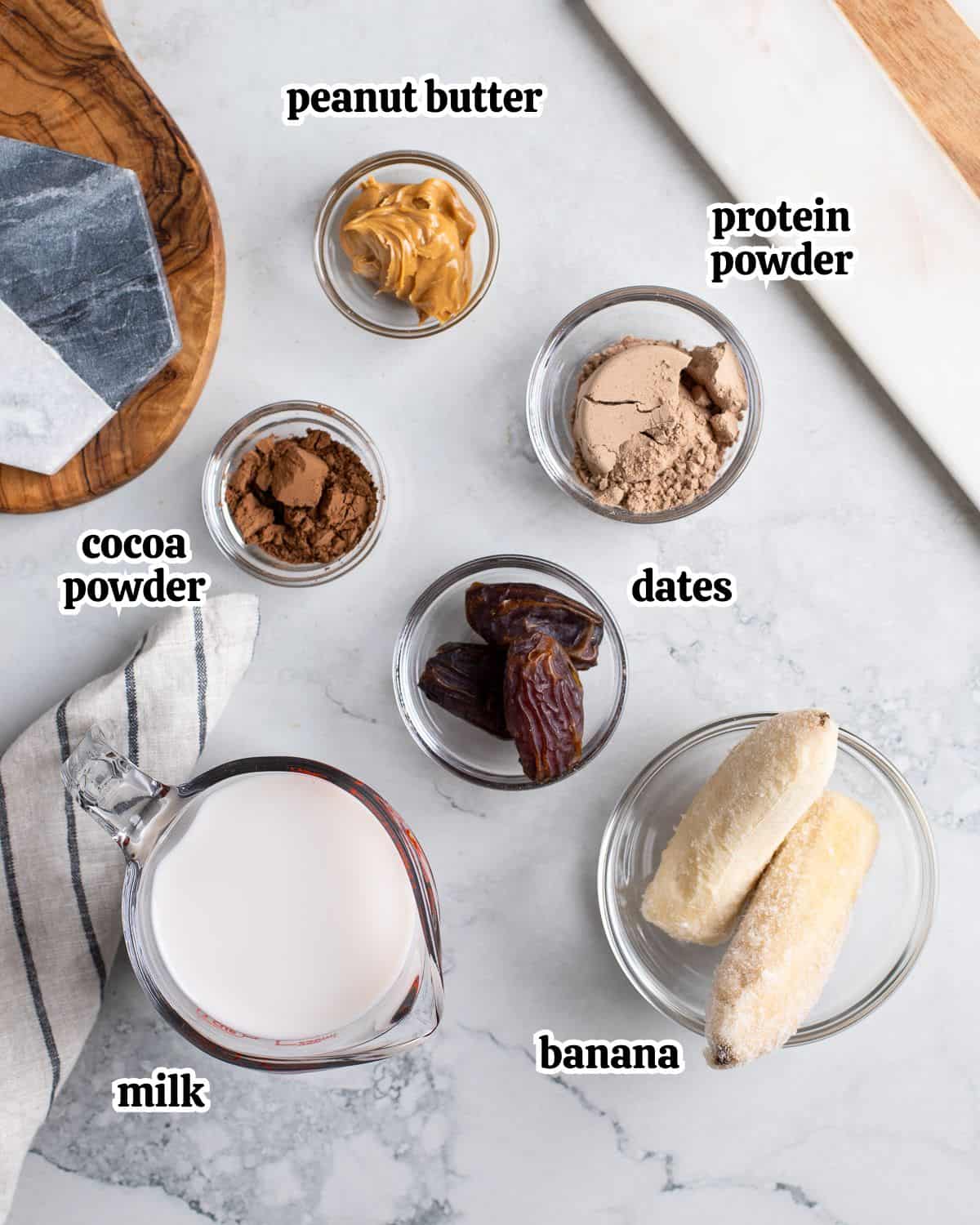The text-labeled date smoothie ingredients in separate containers.