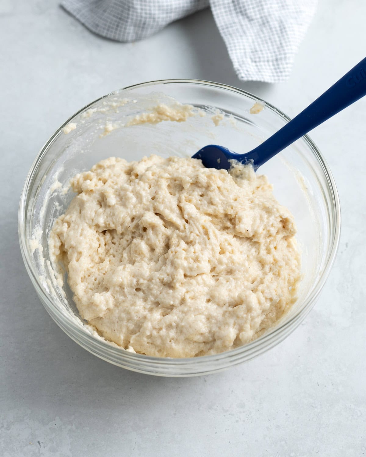 The cobbler topping batter mixed together in a bowl.
