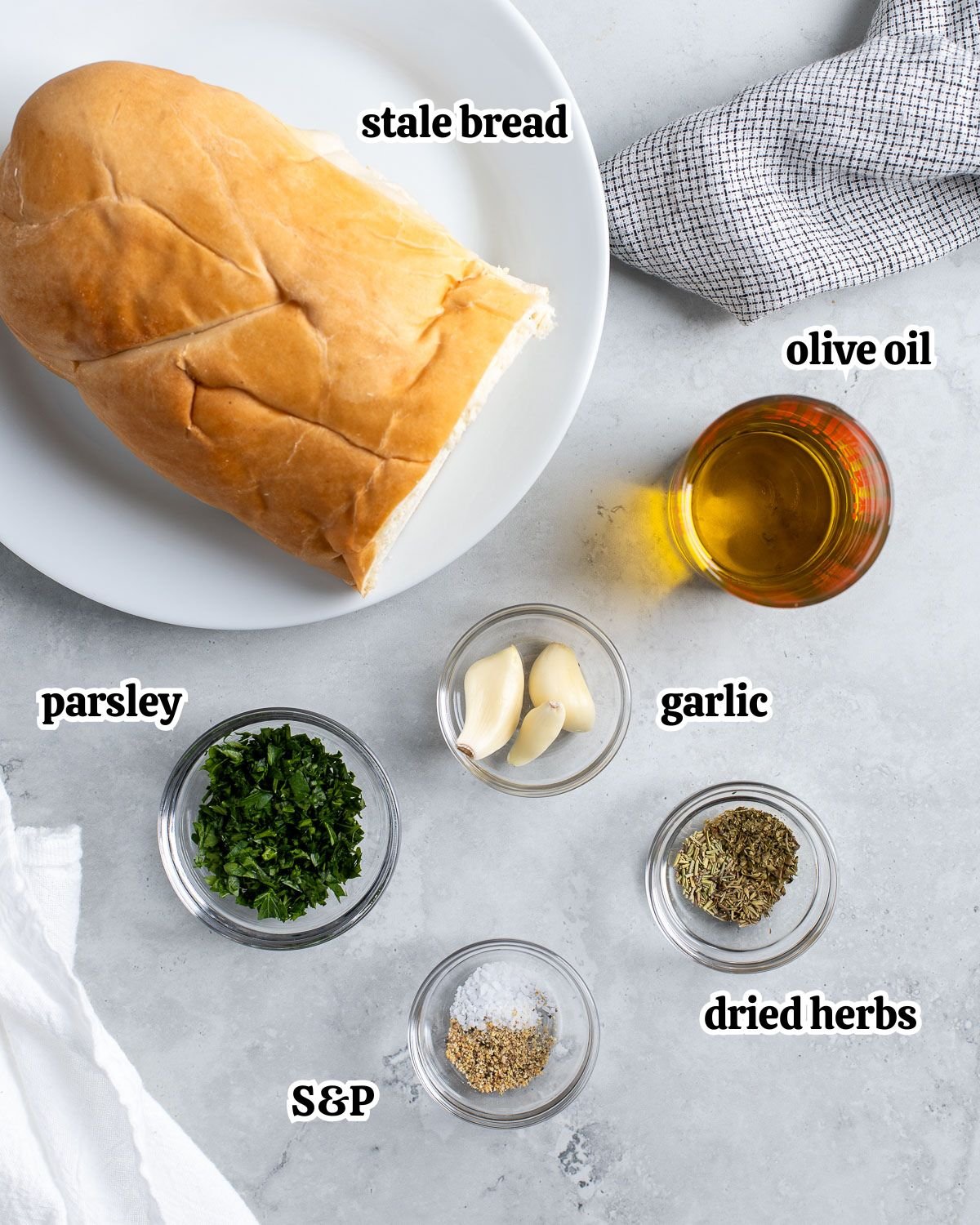 Text-labeled pangrattato recipe ingredients in separate containers.