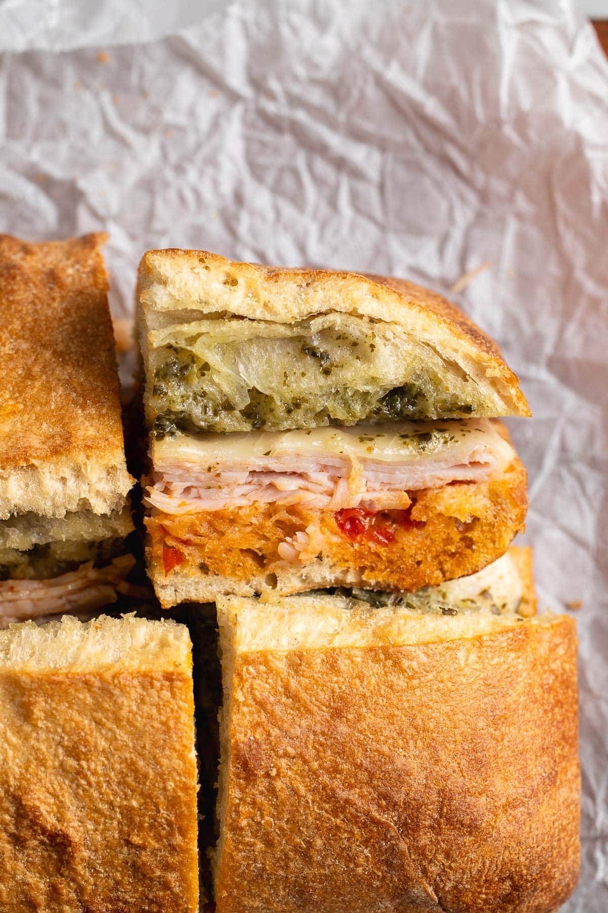 A side view of an end piece of ciabatta sandwich.