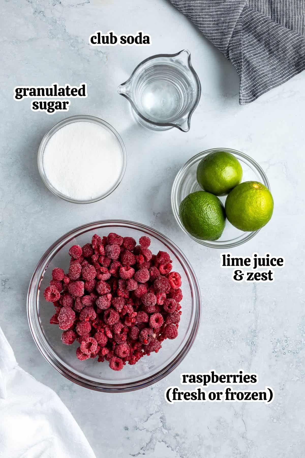 Text-labeled raspberry lime rickey ingredients in separate containers.