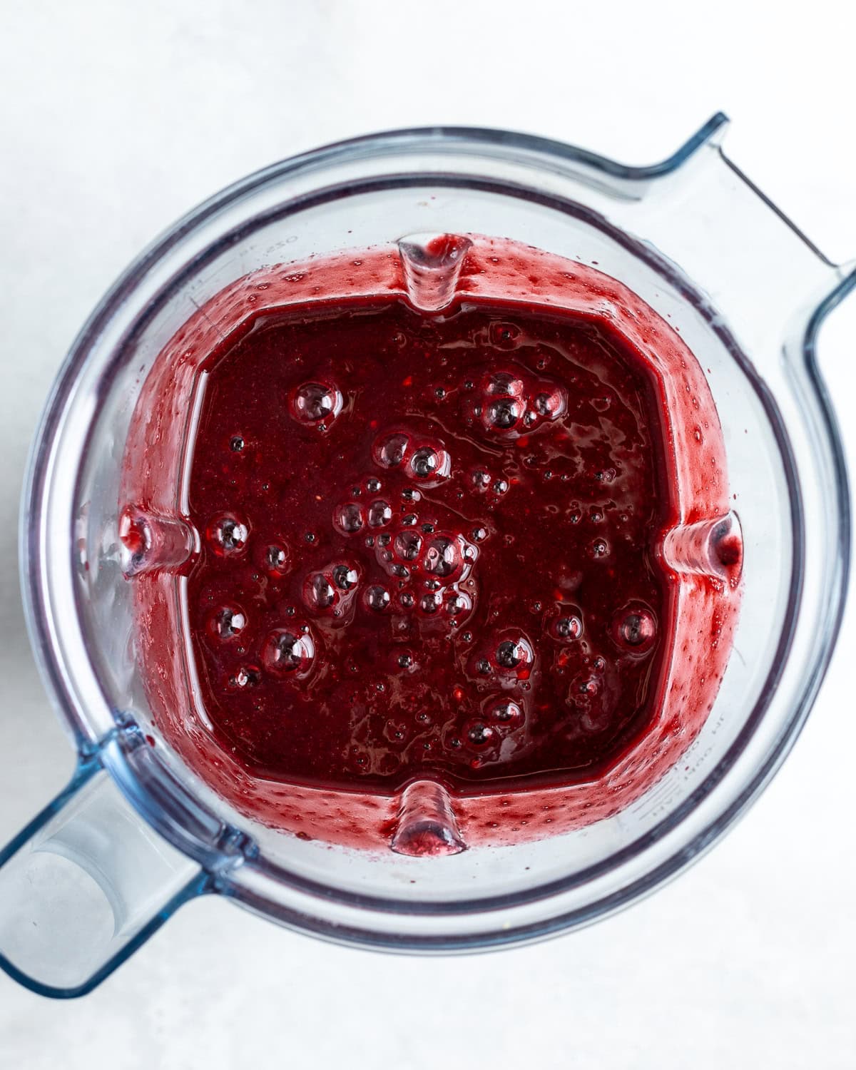 The blackberry granita ingredients blended together in the blender.