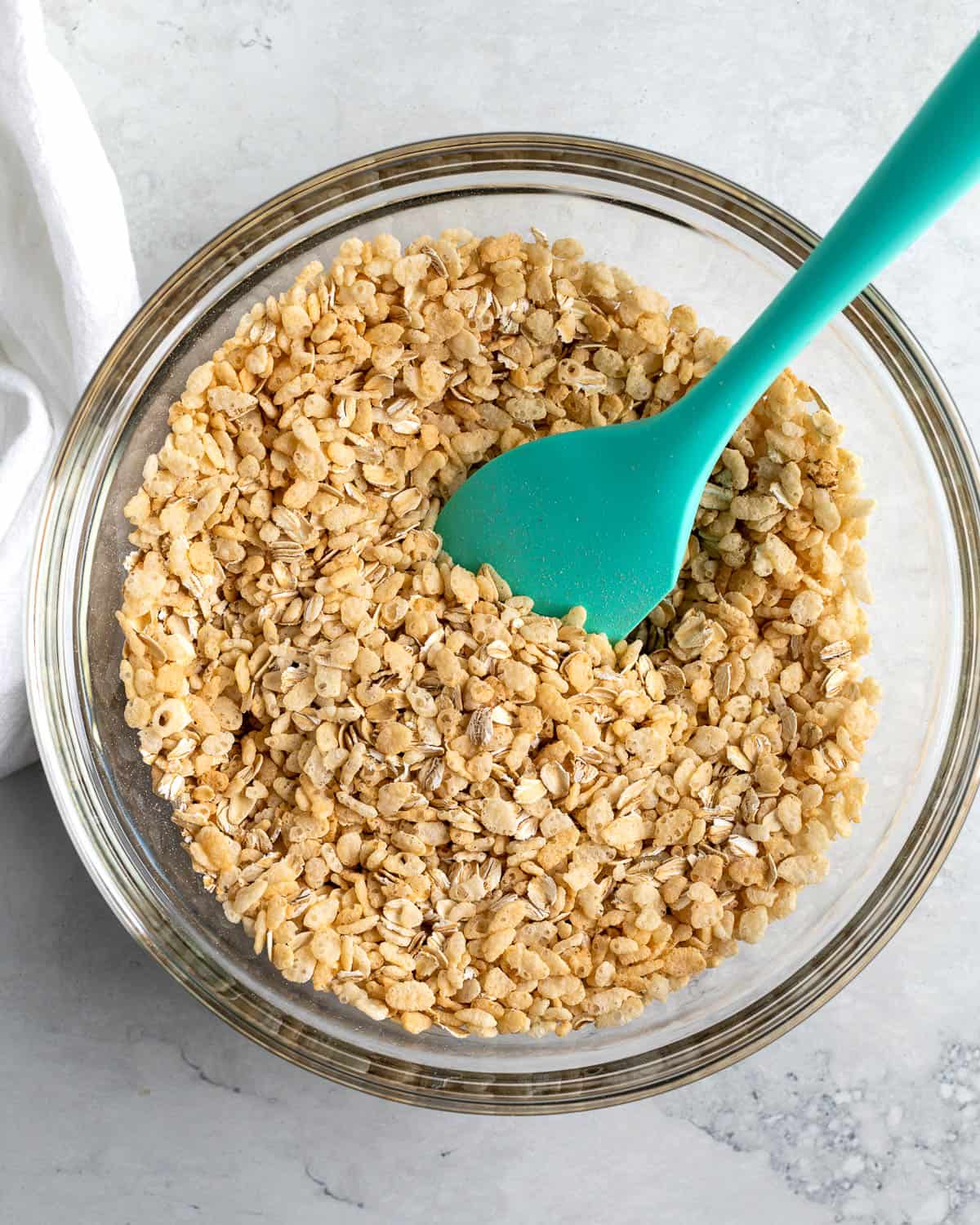 Oats and crisped rice cereal in a bowl.