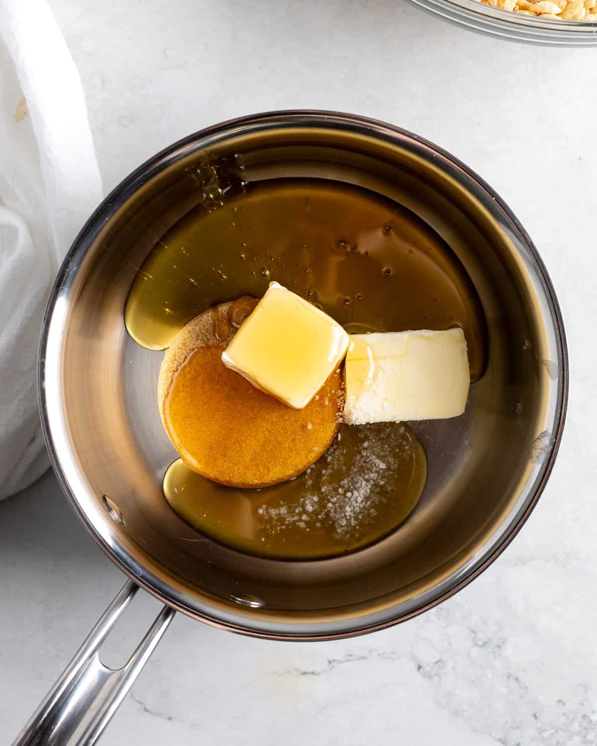 Honey butter, brown sugar, and salt in a saucepan.