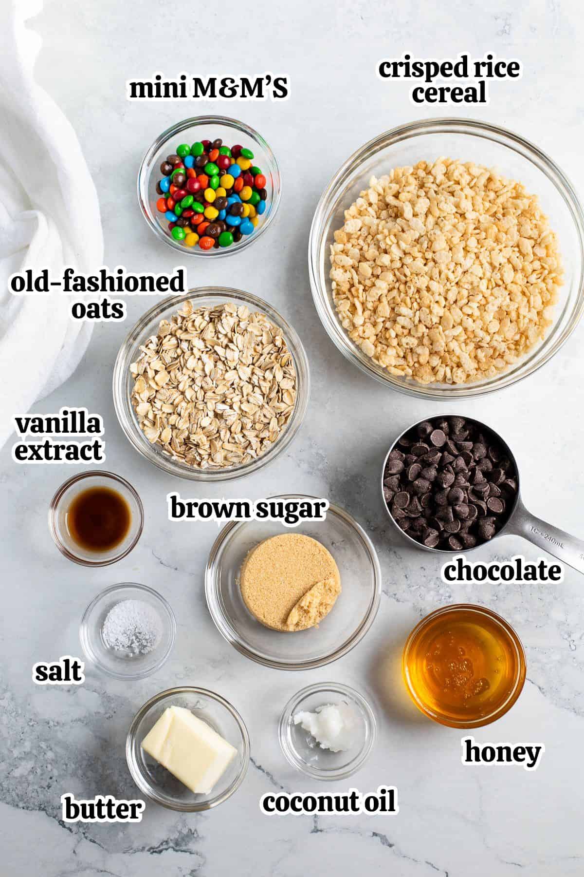 Text-labeled homemade kudos bar ingredients in separate containers.
