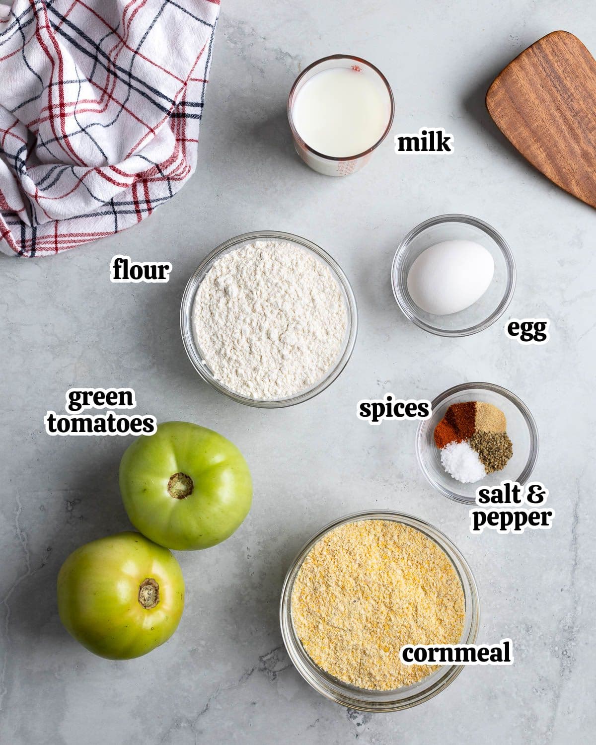 Text-labeled fried green tomato ingredients in separate containers.
