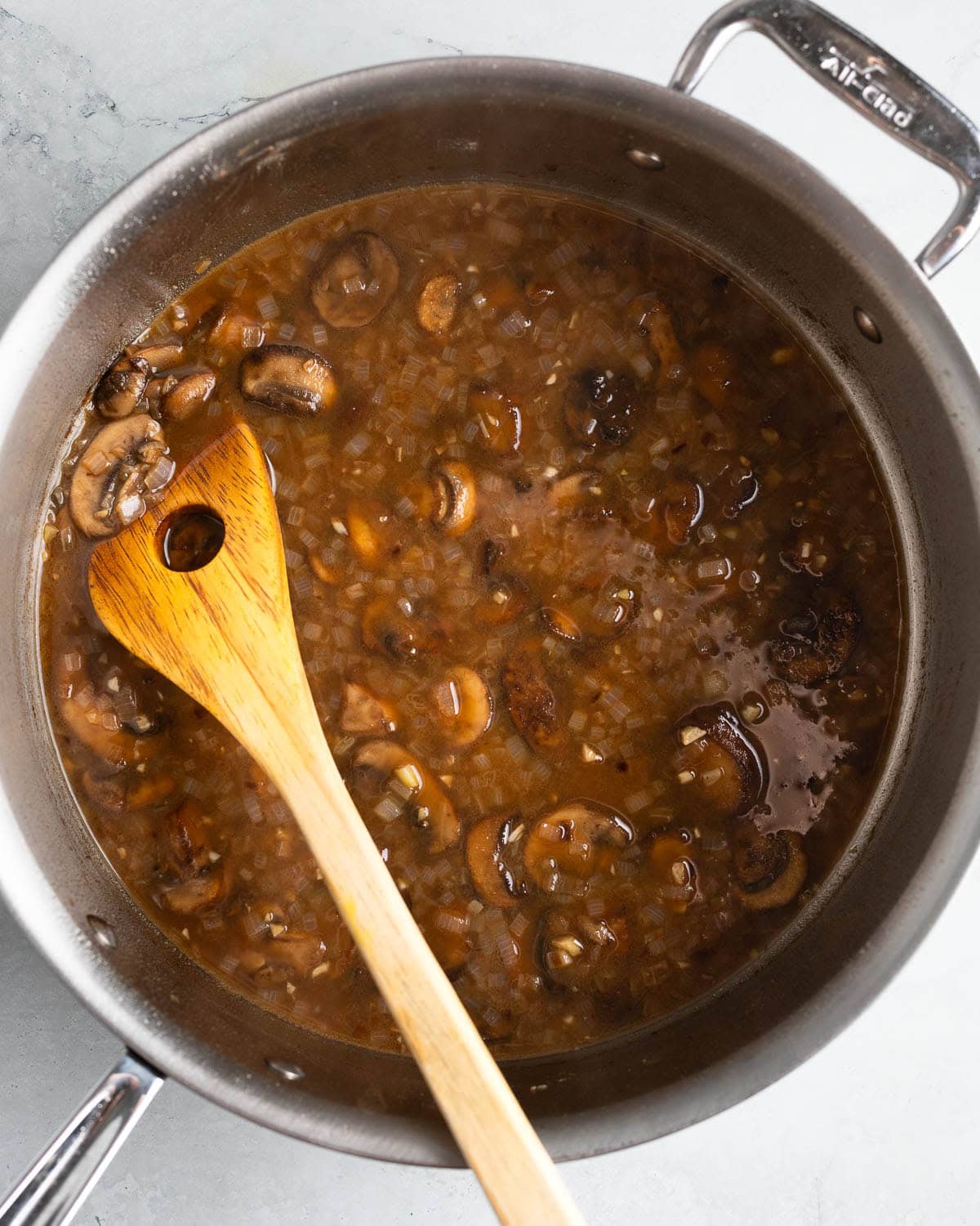 Sauce ingredients poured into the pan.
