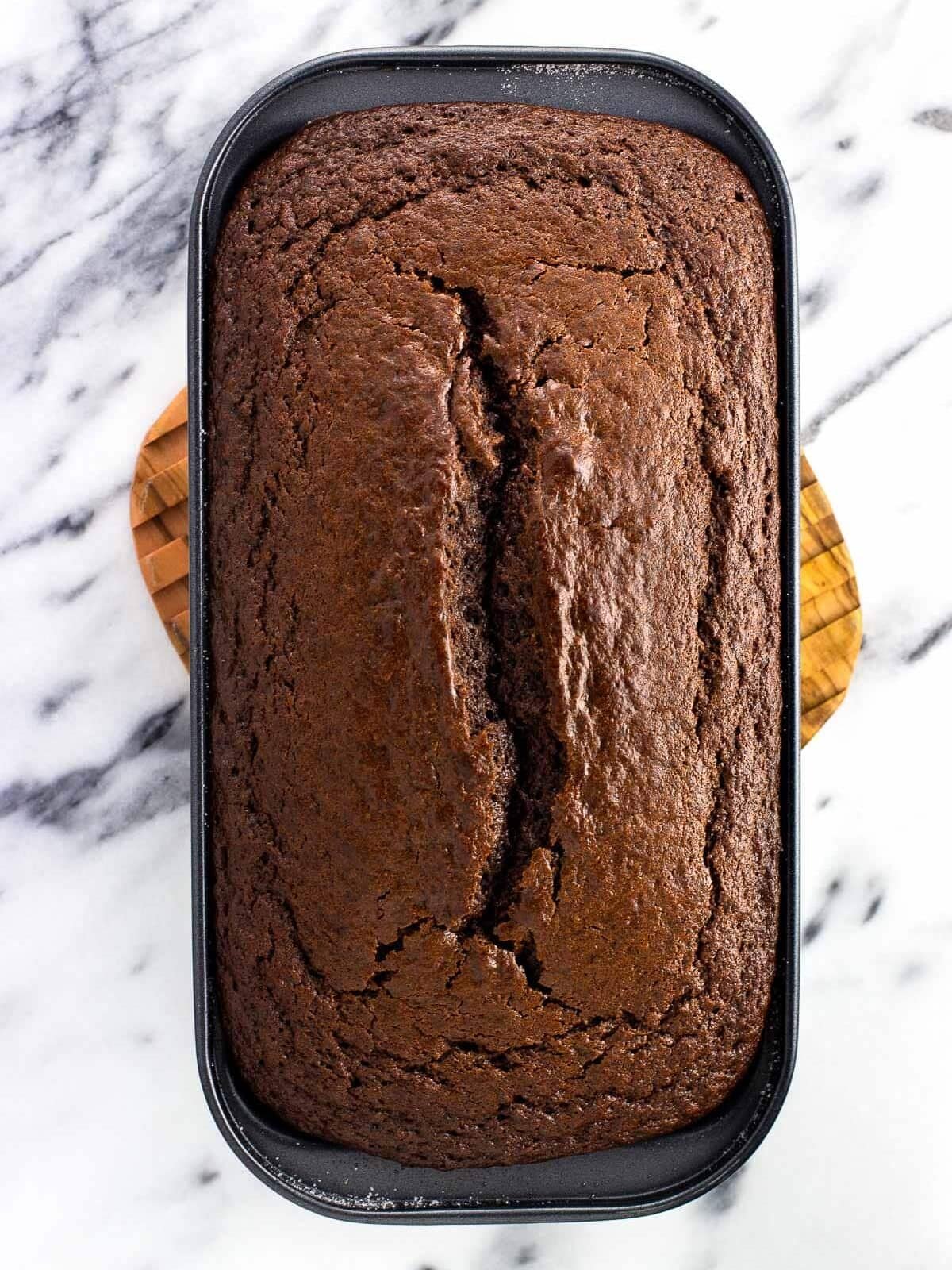 Baked chocolate yogurt cake in a loaf pan.