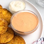 Comeback sauce in a bowl served with green tomatoes.