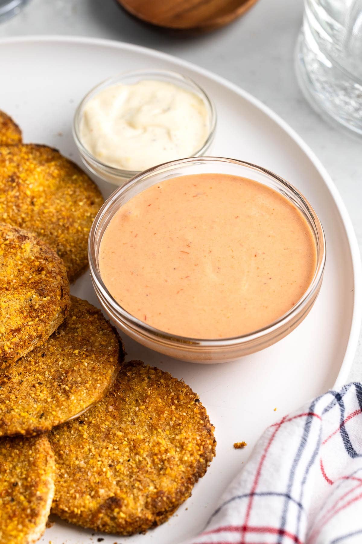 Comeback sauce in a bowl served with green tomatoes.