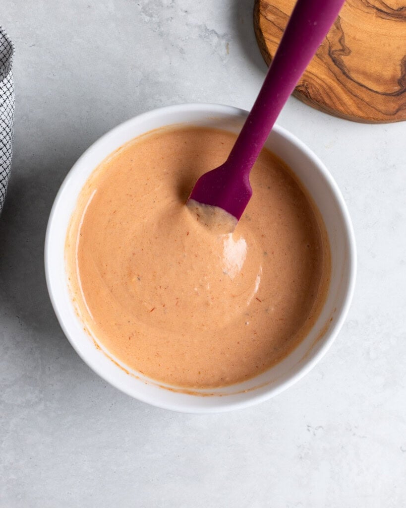 Mixed together comeback sauce ingredients in a bowl.