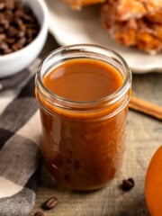 Maple pumpkin spice syrup in a glass jar.