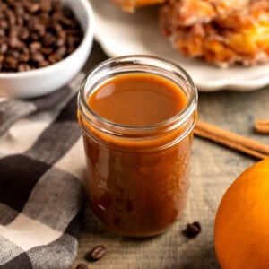 Maple pumpkin spice syrup in a glass jar.