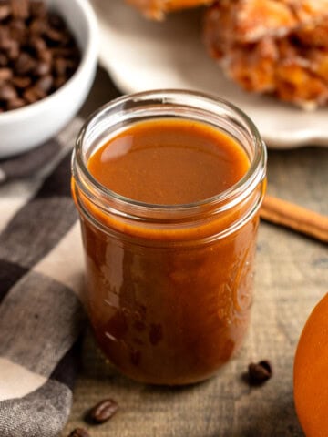 Maple pumpkin spice syrup in a glass jar.