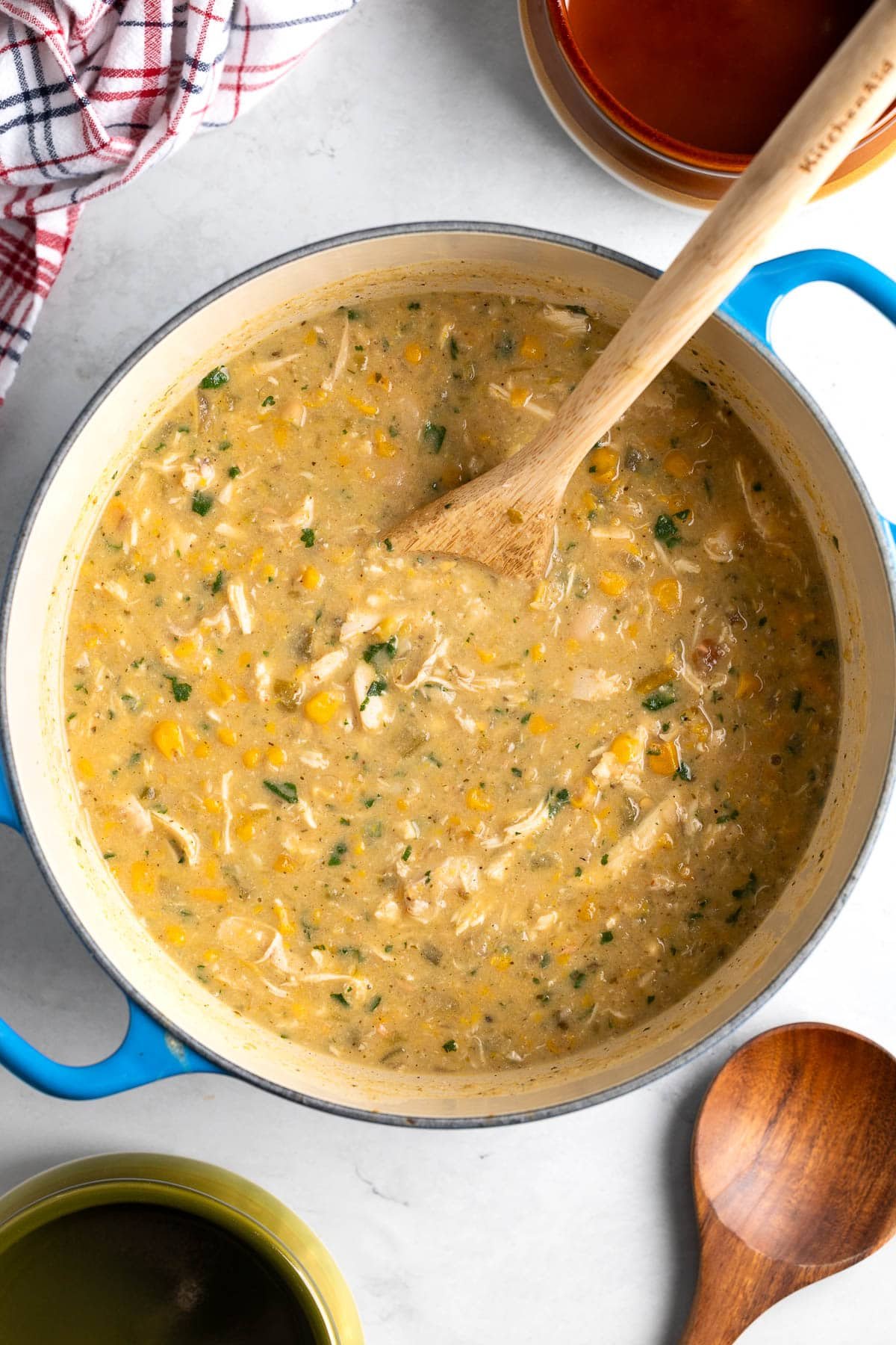 White chicken chili in a round Dutch oven ready to serve.