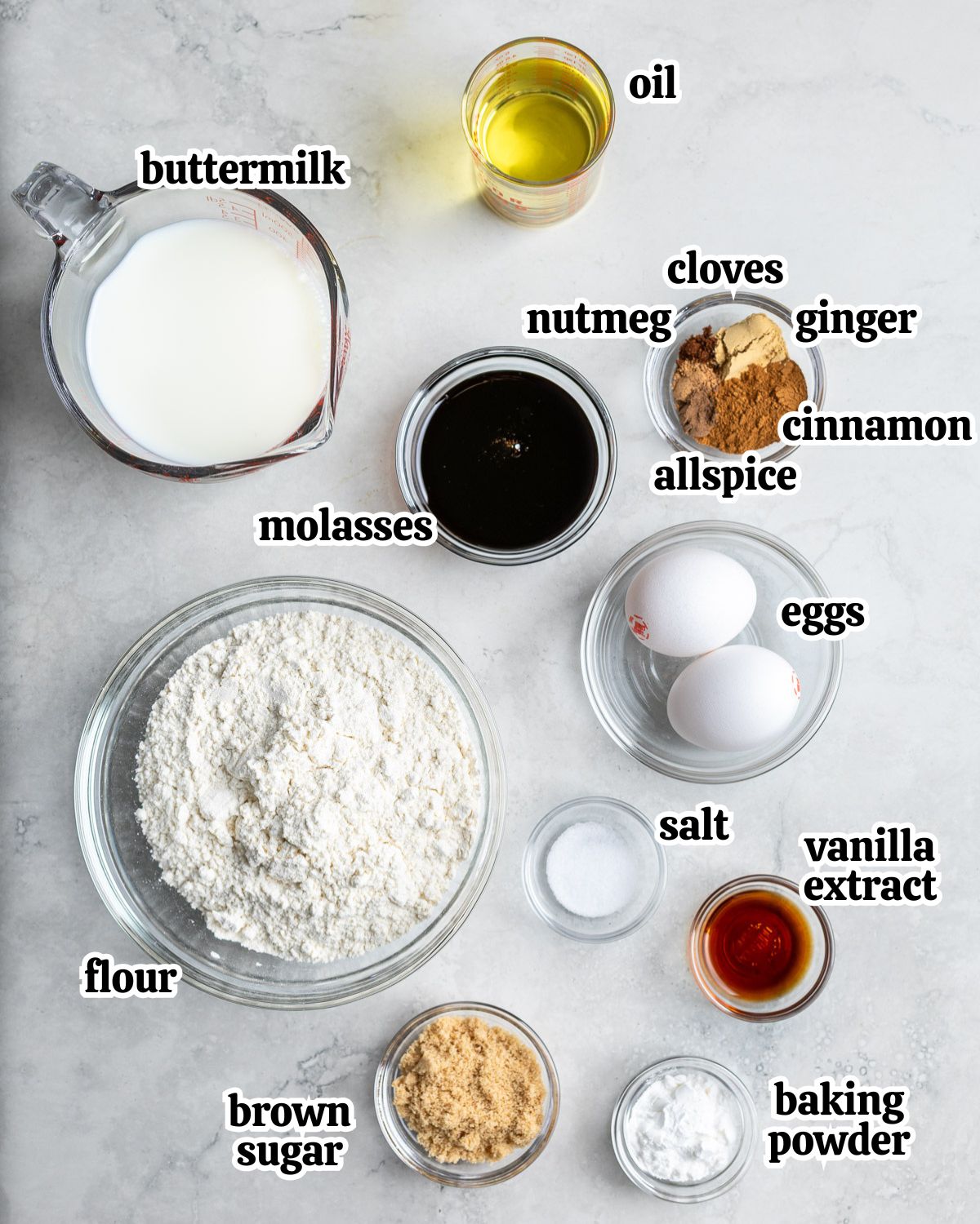 Text-labeled gingerbread waffle ingredients in separate bowls.