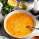 A bowl of Italian penicillin soup thickened with egg.