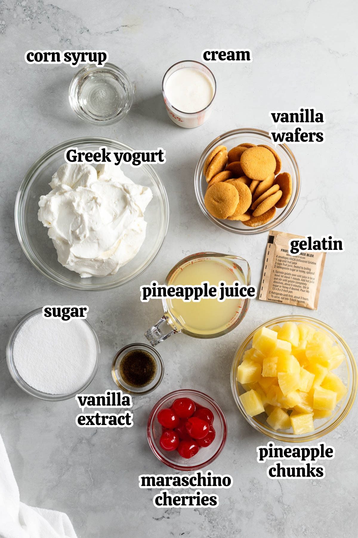 Text-labeled pineapple frozen yogurt ingredients in separate containers.