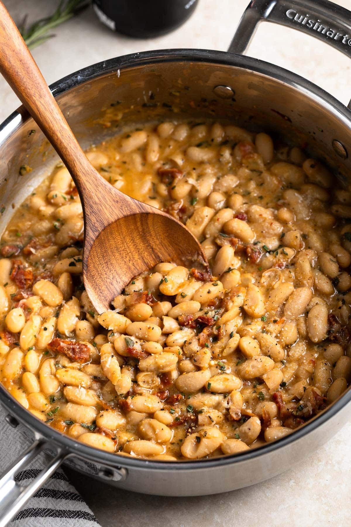 Creamy Tuscan white beans in a skillet.