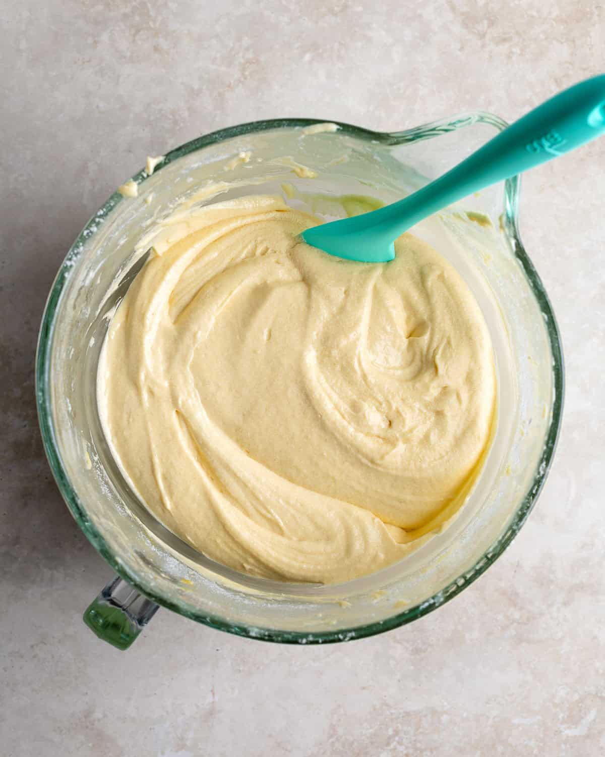 The finished Philly Fluff batter in a glass mixing bowl.