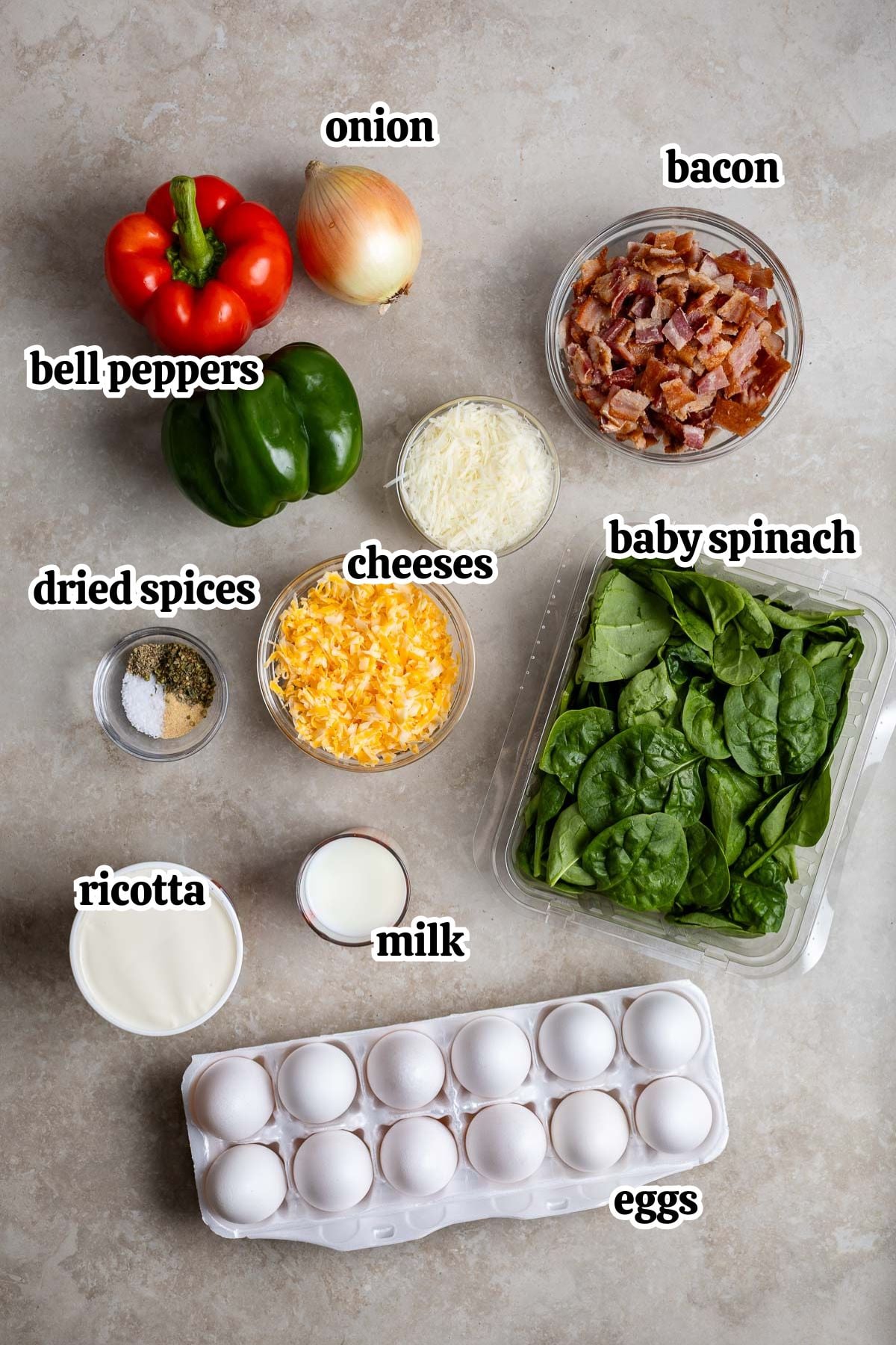 Text-labeled ricotta egg bake ingredients in separate containers.