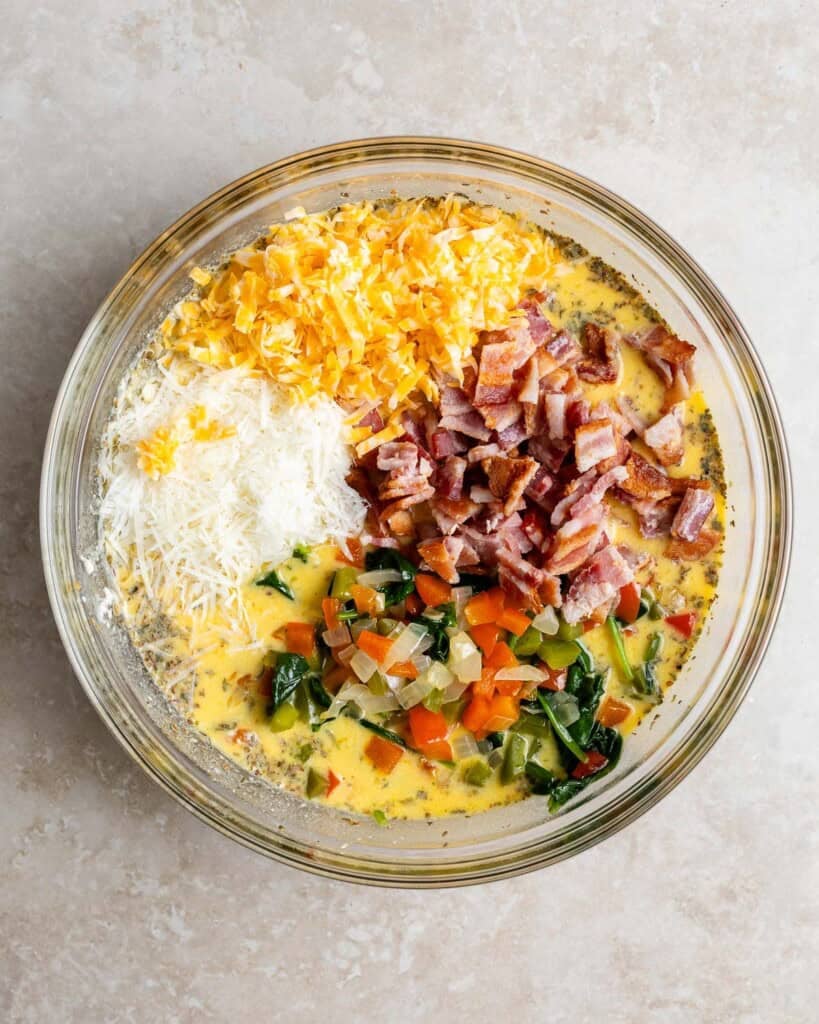 The rest of the egg bake ingredients added to the bowl with the beaten egg/ricotta/milk mixture.