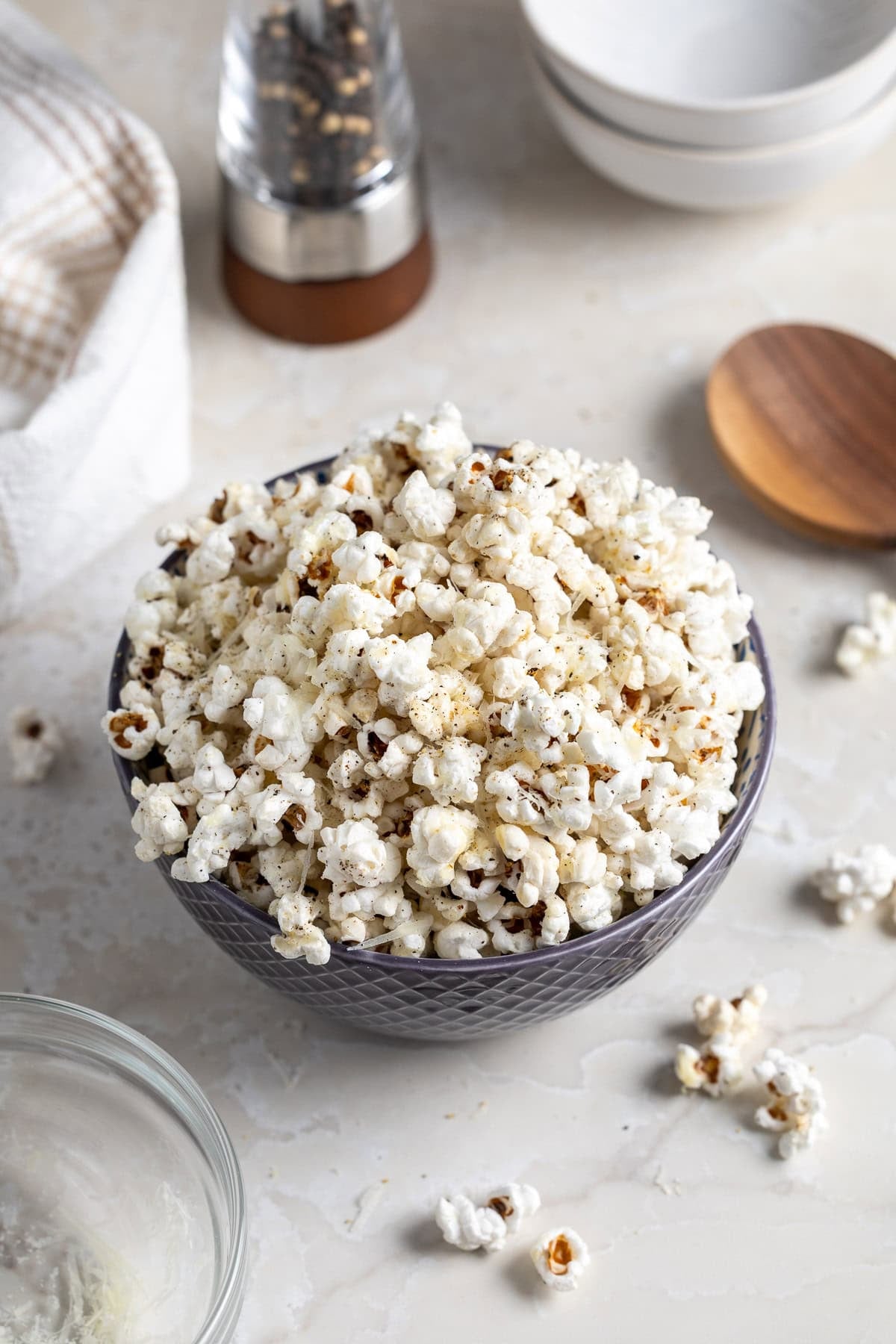 A medium bowl of cacio e pepe popcorn.