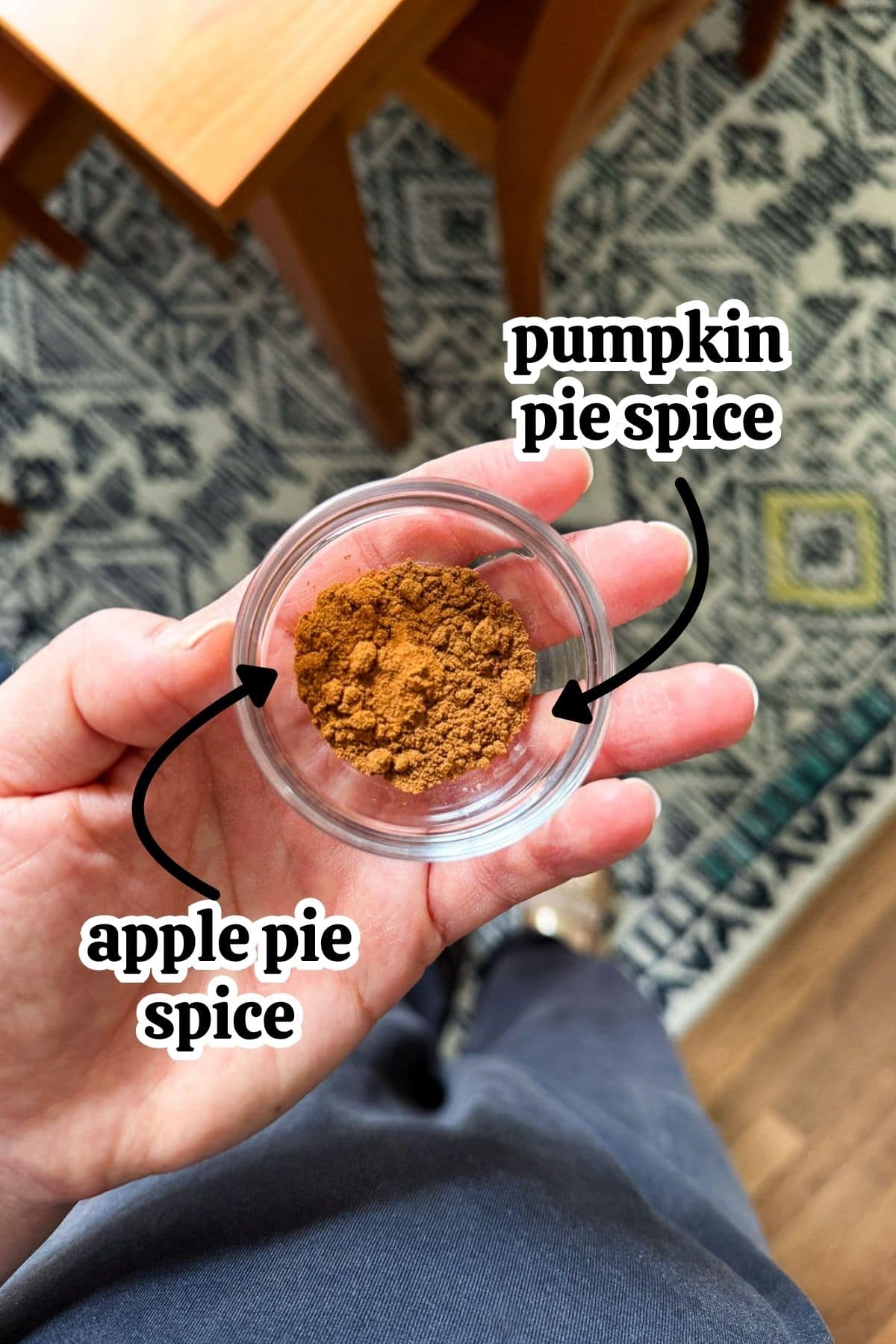 Pumpkin pie spice and apple pie spice next to one another in a small glass bowl.
