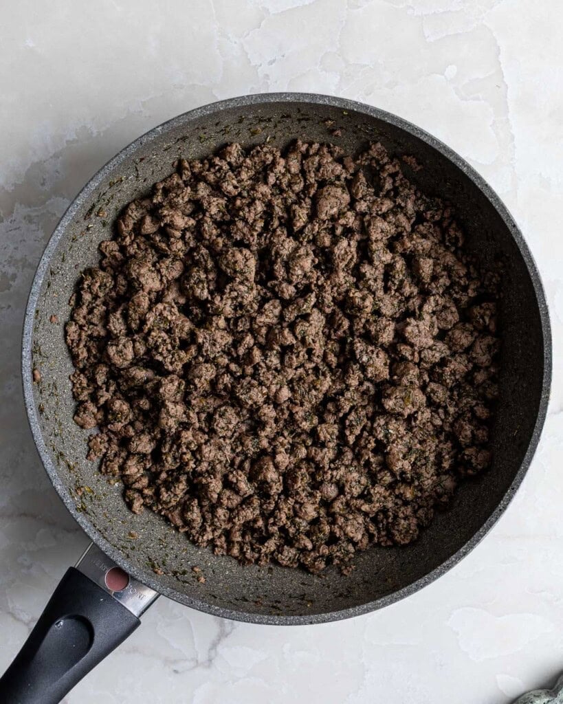 Mediterranean dill spiced beef cooked in a pan.