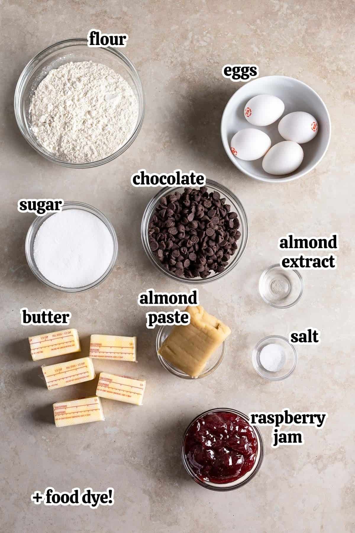 Text-labeled Italian rainbow cookie ingredients in separate containers.