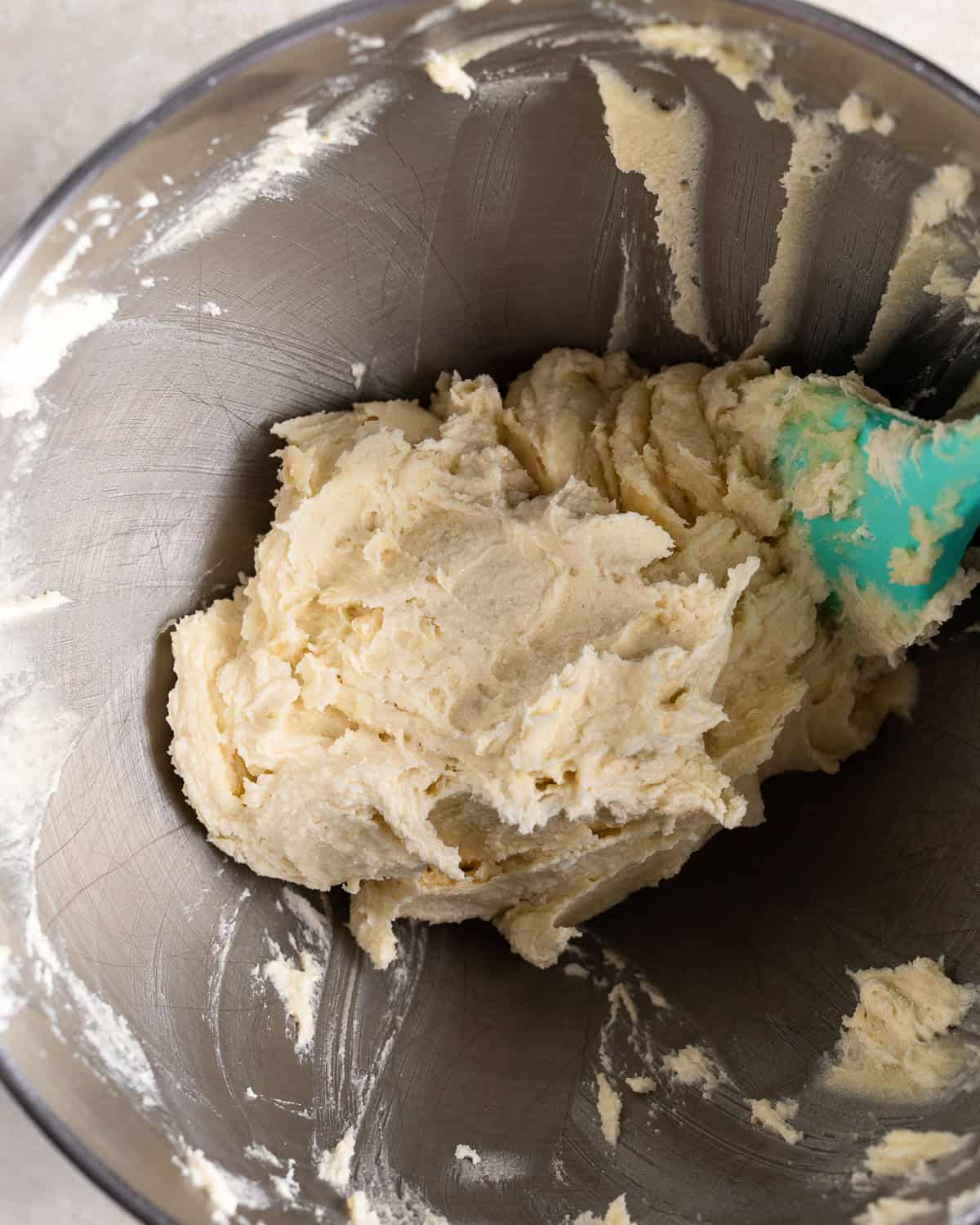 Softened butter mixed into the almond paste and sugar.